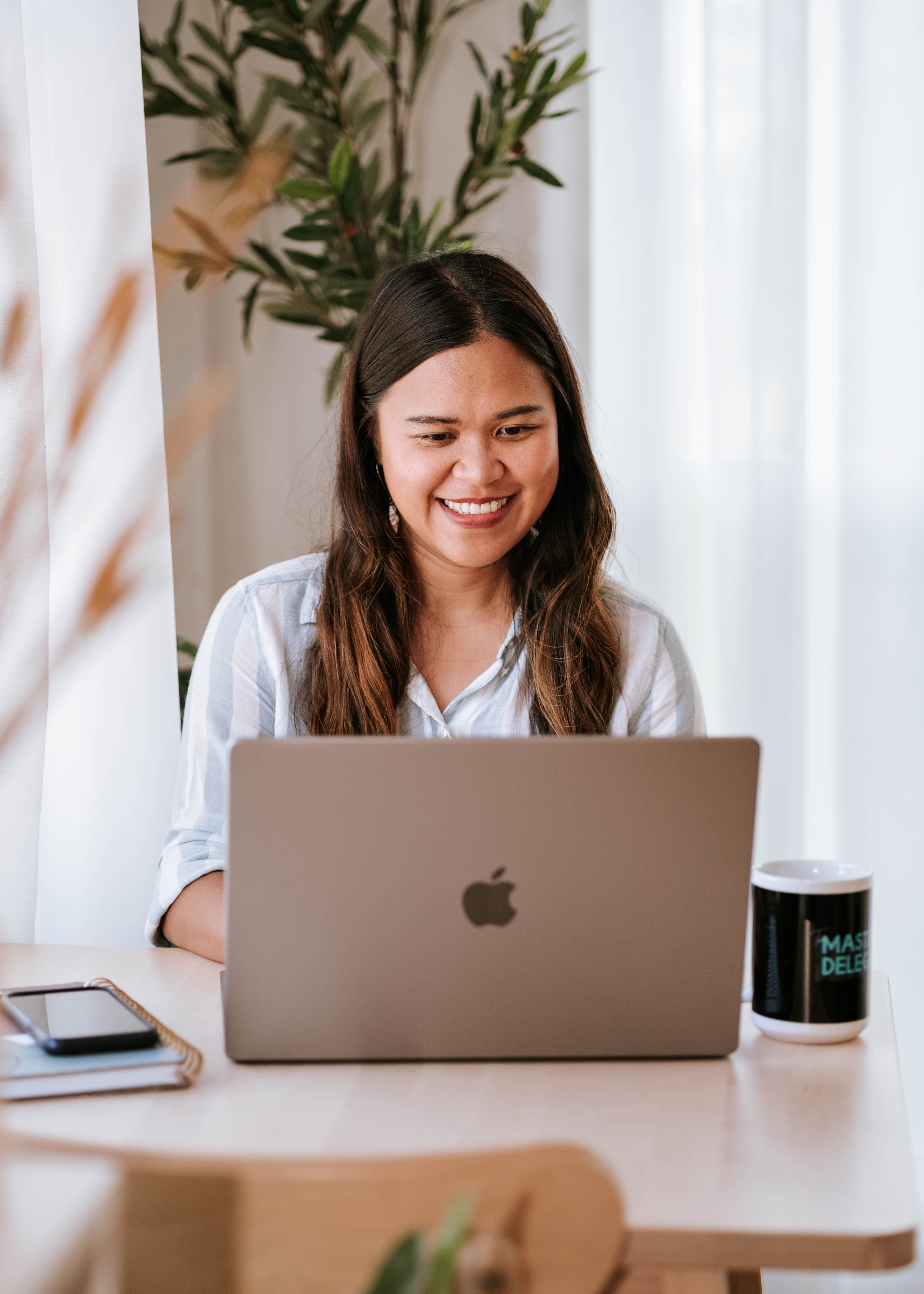 Kristy Yoder working at her desk